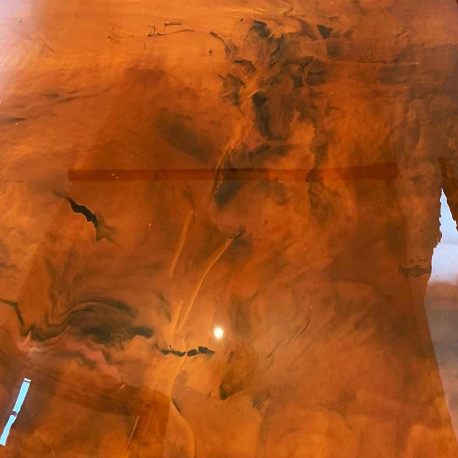 Rich copper coloured epoxy floor installation in Coventry by Elite Resin Scapes