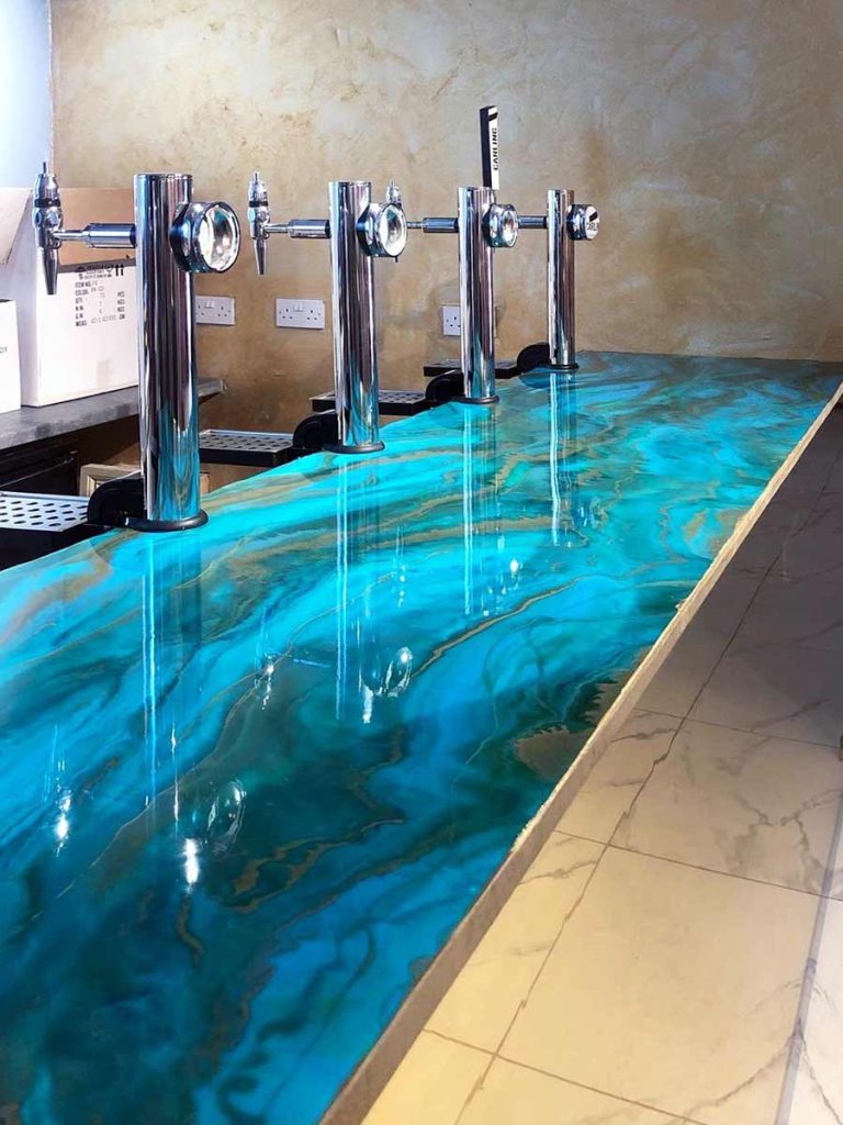 Blue metallic epoxy countertop on a bar in the Midlands