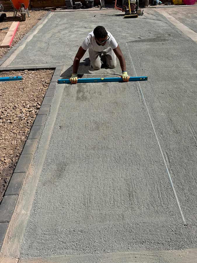 Groundworks and levelling in preparation for a new artificial grass lawn.